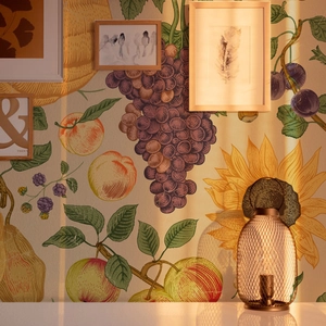 Vintage hand-painted fruit and floral wallpaper featuring grapes, apples, and sunflowers