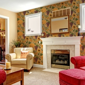 Vintage harvest wallpaper with pumpkins and sunflowers in a cozy living room scene