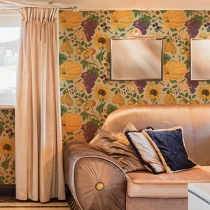 Vintage pastoral wallpaper with pumpkins, grapes, and sunflowers for home decor