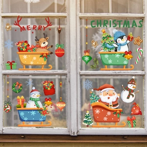 Christmas static window decals featuring Santa, reindeer, and snowflakes on a glass window