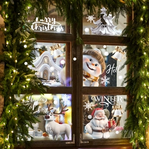 Festive Christmas window decals featuring Santa and reindeer on vintage glass