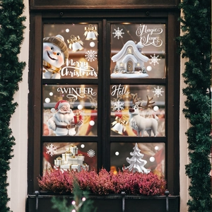 Christmas window stickers featuring 3D Santa, reindeer, and snowflakes for holiday decor