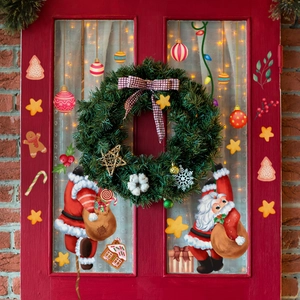 Christmas static window decals set with Santa and reindeer on glass door background