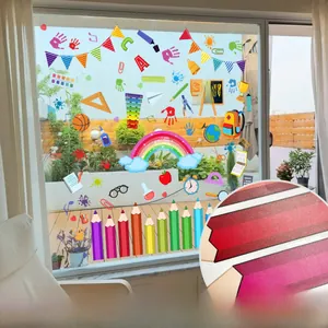 Detail of double-sided back to school window stickers with rainbow and pencil motifs