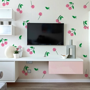Detail of pink cherry wall decals in a modern living room setting for home decoration