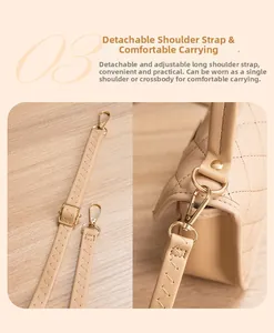 Detail des verstellbaren abnehmbaren Schultergurts mit goldenen Schnallen an beiger Tasche