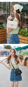 Detailansicht der gesteppten Kunstlederhandtaschen mit goldenen Drehverschlüssen
