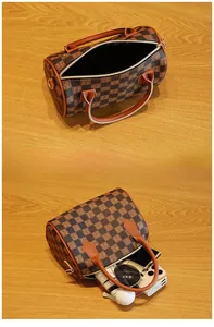 Interior view of cylinder Boston bag showing spacious storage for daily essentials