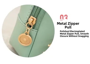 Detailed macro view of mint green PU leather bag with smooth polished gold metal zipper