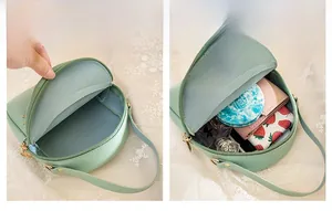 Detail view of mini green round crossbody bag interior capacity for daily essentials