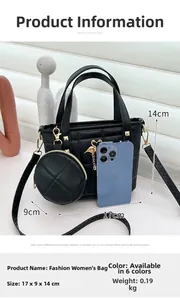 Detail view of black quilted crossbody bag with golden swan charm and coin pouch size 17x9x14cm
