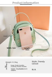 Detail view of mini green cat-shaped backpack showing 17x14x5cm dimensions and PU texture