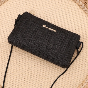 Minimalist black woven straw chain crossbody bag for summer fashion beach vacation