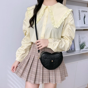 Fashionable black heart-shaped crossbody bag with V-quilted stitching and gold button