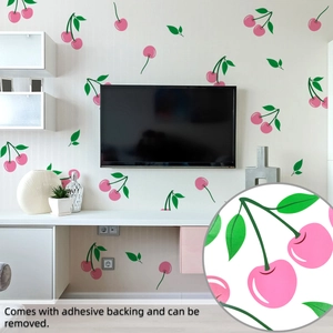 Detail of pink cherry wall decals on living room wall with self-adhesive PVC texture