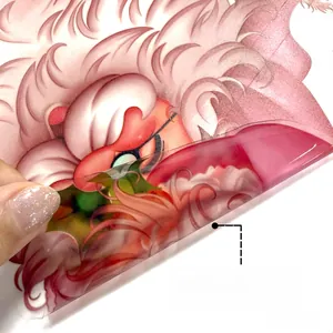 Detail showing double-sided pink anime character patterns on a clear electrostatic sticker