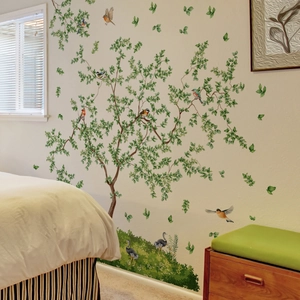 Nursery wall sticker featuring a large green tree with colorful birds and grass