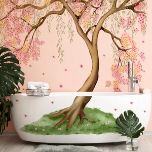 Détail de stickers muraux d'arbre fleuri rose posés sur un mur de salle de bain et baignoire