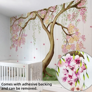 Détail du sticker mural cerisier rose montrant la texture adhésive dans la chambre