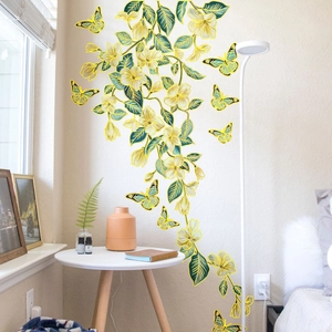Detailed wall sticker featuring hand-drawn yellow floral vines and golden butterflies