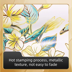 Detail of floral butterfly wall sticker featuring gold stamping and metallic texture