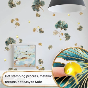 Macro detail of golden gingko leaf wall stickers with metallic hot stamping texture