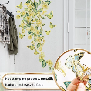 Detail of wall stickers showing bronzing craft flower and golden butterfly textures