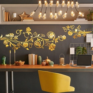 Golden floral rose wall decals shown on dark wall in cozy home office setting