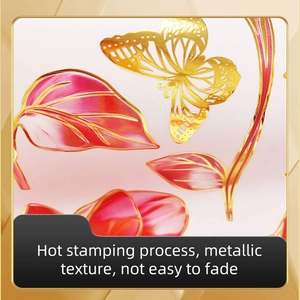 Detail of hot stamping gold butterfly wall sticker with metallic texture and pink leaves