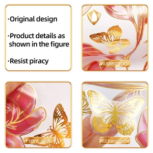 Detail of waterproof gold-stamped floral and butterfly wall stickers with vibrant pink accents
