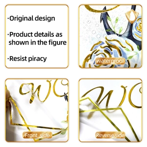 Close-up of waterproof gold foil floral wall stickers with original design details