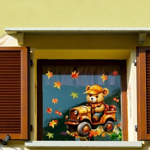 Detail of autumn window stickers featuring a cartoon bear in a car with maple leaves