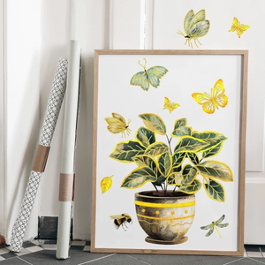 Detail of framed watercolor wall sticker with green plants and gold foil bees for kids room
