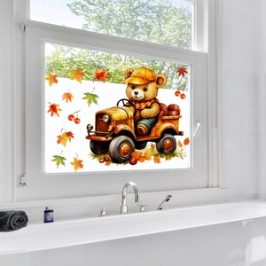 Detailed view of autumn bear on tractor window sticker with maple leaves for home decor