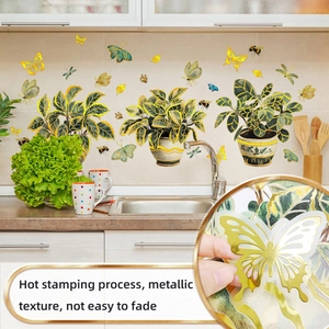 Detail of hot stamping wall stickers with gold metallic texture and butterfly patterns