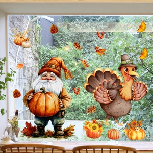 Detail of harvest gnome and turkey static window clings on transparent glass