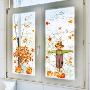Detail of static autumn window decals with scarecrow, pumpkins and maple leaves decoration