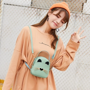 Mini mint green cat-shaped crossbody bag made of PU leather with cute ear details