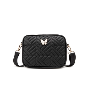 Black chevron quilted camera bag with butterfly clasp and wide woven strap