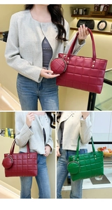 Detail of quilted tote bag featuring metal rivets and matching round coin purse accessory