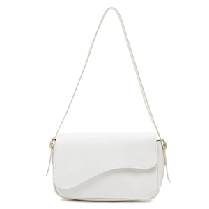Chic white shoulder bag with wavy flap design and gold hardware on white background
