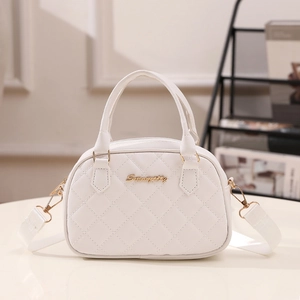 Elegant white quilted shell handbag with gold hardware and removable shoulder strap