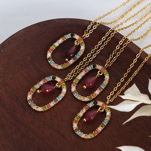 Bohemian gold chain necklaces with colorful stone pendants and red teardrop accents