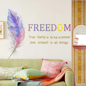 Detail of colorful feather wall decal with Freedom text in a bright living room setting