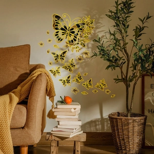 Detail of self-adhesive butterfly wall stickers with gold foil texture and yellow flowers