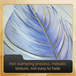 Detailed view of feather wall sticker with gold foil texture and metallic hot stamping