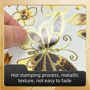 Detail of floral butterfly wall sticker featuring hot stamping and metallic gold texture