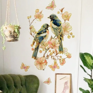 Floral wall decal set with hand-painted birds and butterflies on white wall