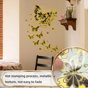 Detail of hot stamping butterfly wall stickers with metallic gold texture and floral patterns