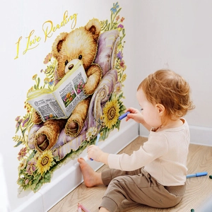 Muursticker met lezende beer op bank en tekst I Love Reading voor decoratie kinderkamer